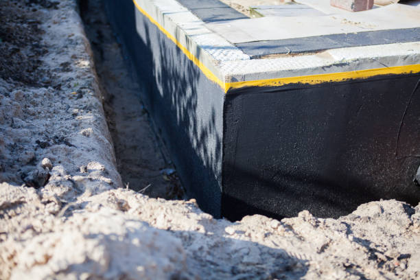 Professional Basement Waterproofing technician working in Felicity, OH